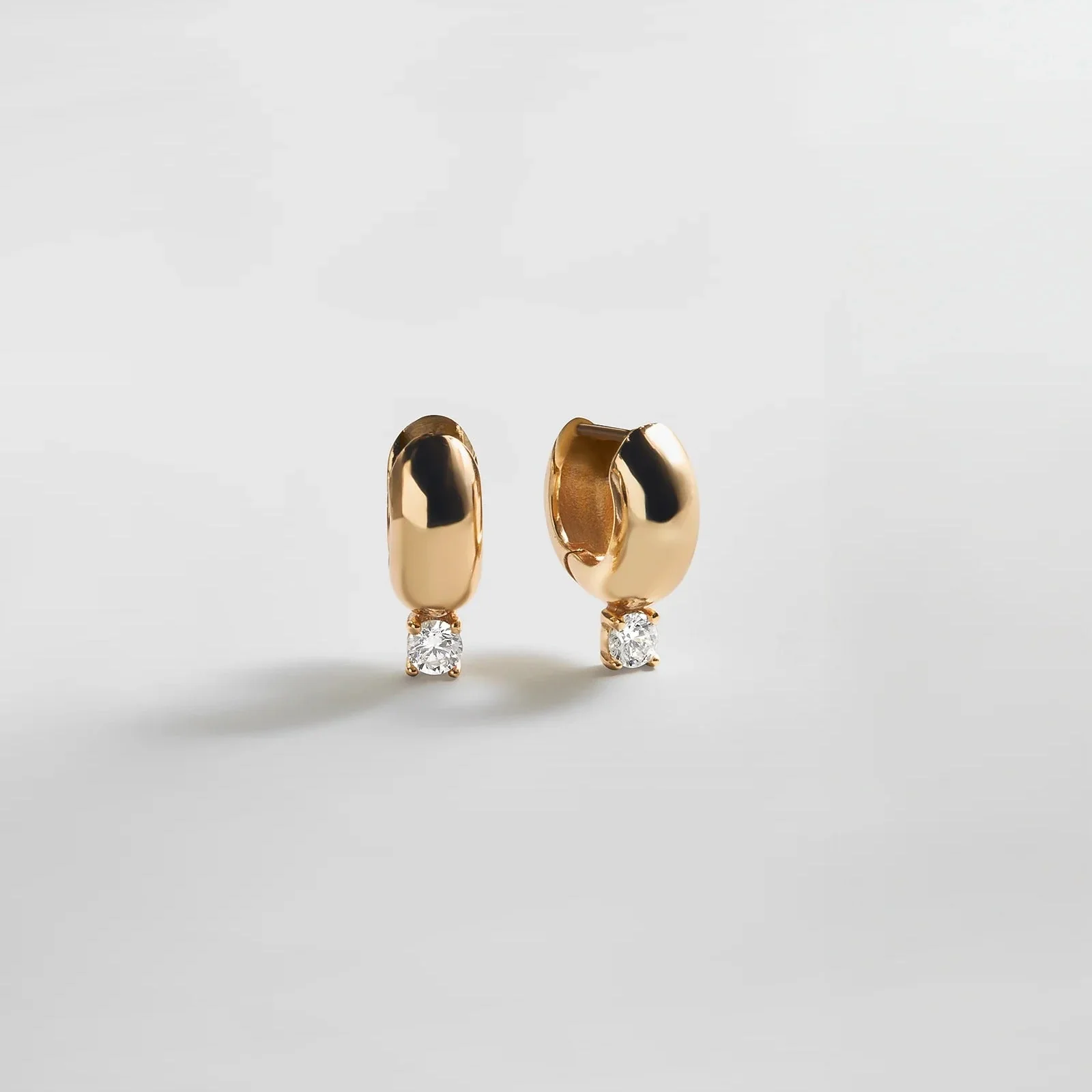 Kourtney Huggie Earrings - Kourtney Gold Plated Brass Earrings